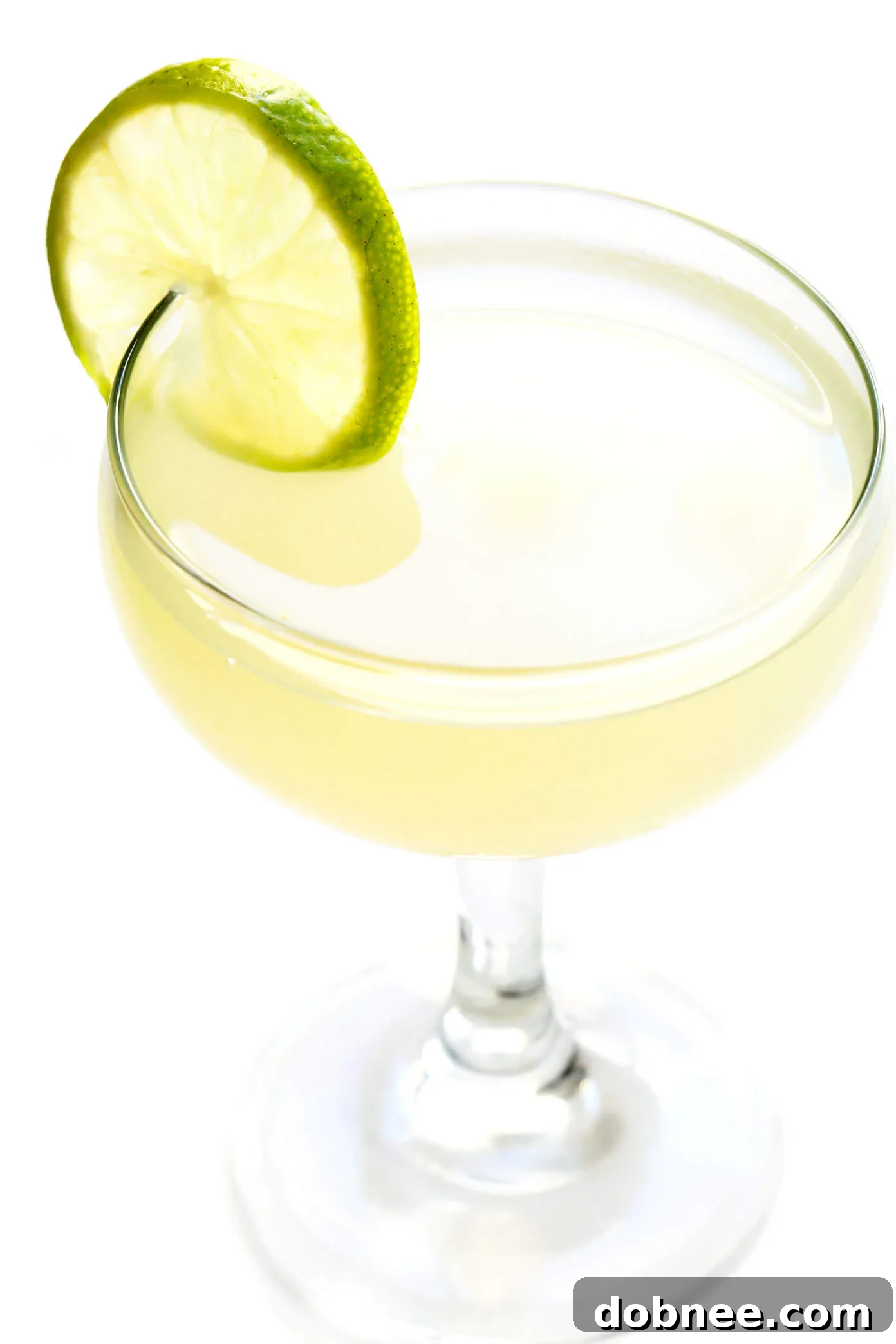 Classic Gimlet Cocktail Recipe with Gin and Fresh Lime Juice, sweetened with Honey Simple Syrup