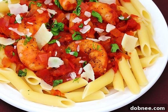 Shrimp Fra Diavolo Pasta with a vibrant red sauce, succulent shrimp, and fresh herbs, ready to be served.