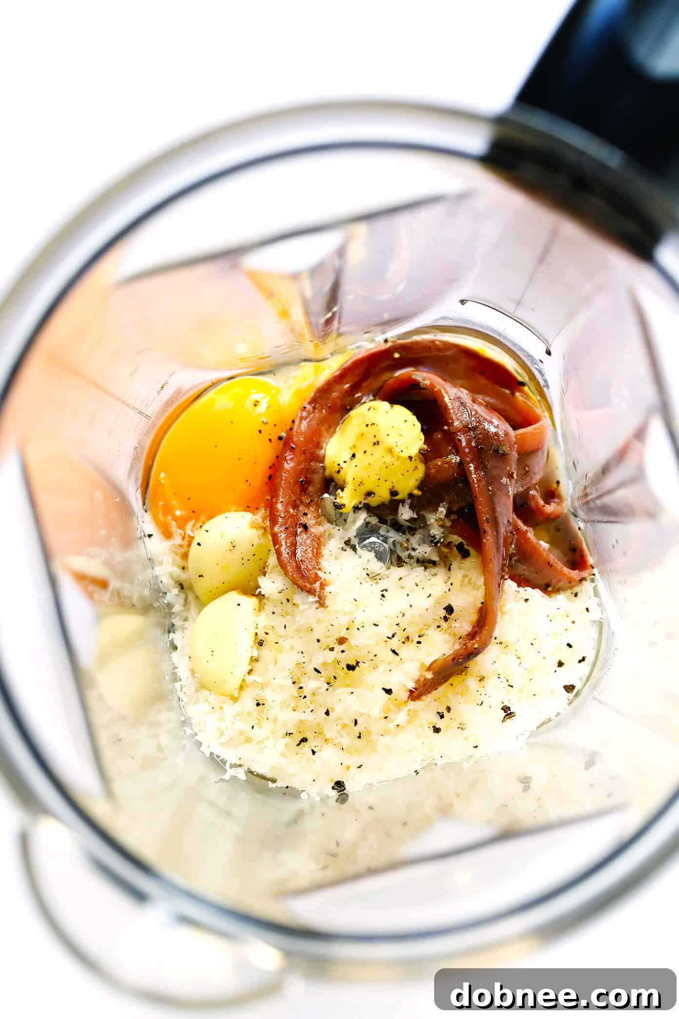 Caesar Dressing ingredients ready for blending in a blender
