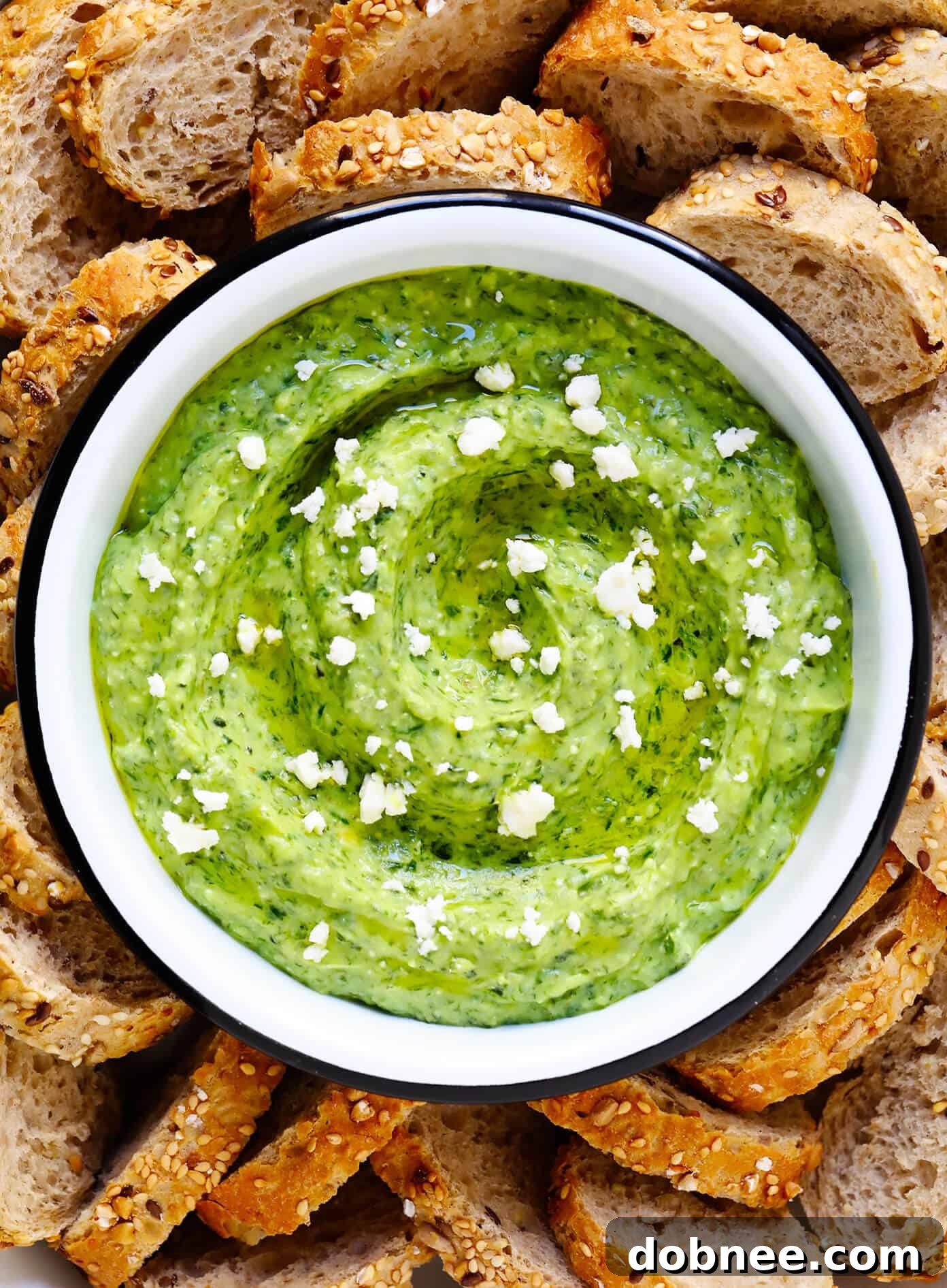 Green Goddess Feta Dip served with slices of crusty bread