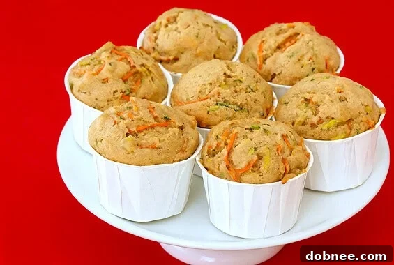 Carrot & Zucchini Muffins | A Healthy & Delicious Recipe Delicious and healthy carrot zucchini muffins fresh out of the oven, perfect for breakfast or a snack.