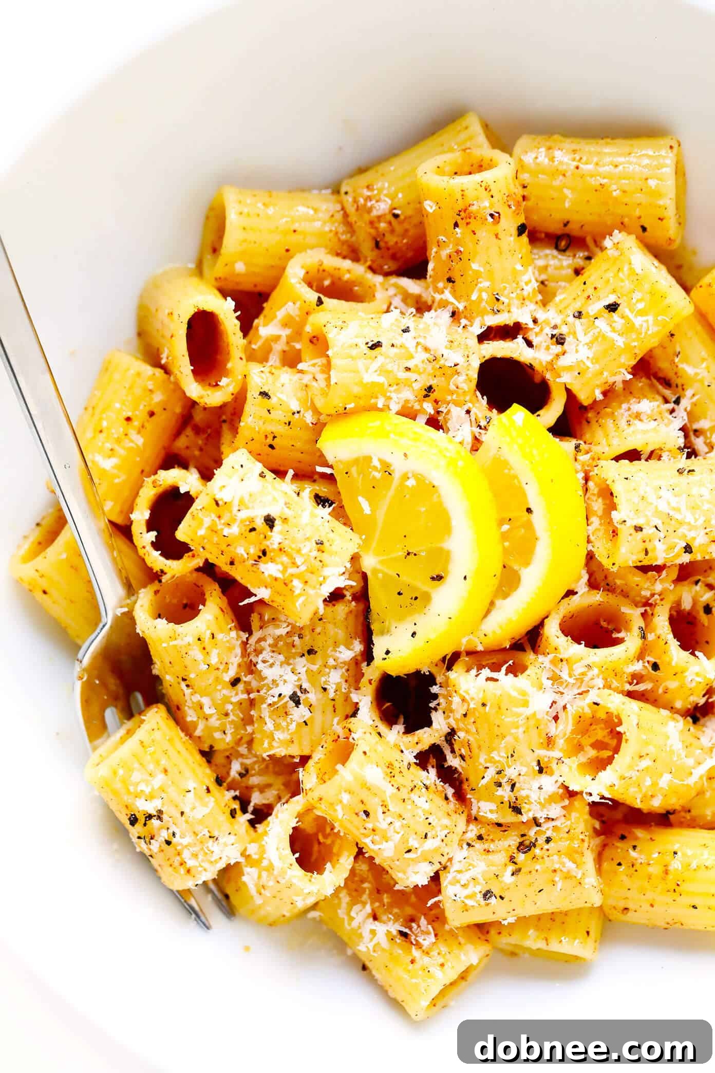 Close-up of Lemon Pasta in a serving dish, highlighting the glossy sauce