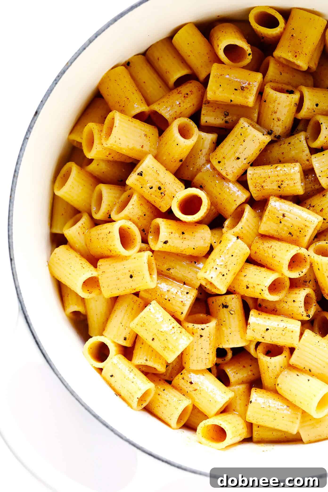 Brown Butter Lemon Pasta in a large pot, with ingredients ready for the final toss