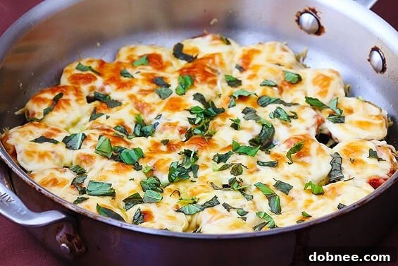 Delicious Zucchini Parmesan with golden brown cheese