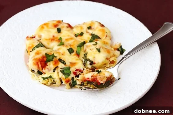 Close-up of baked Zucchini Parmesan, ready to serve