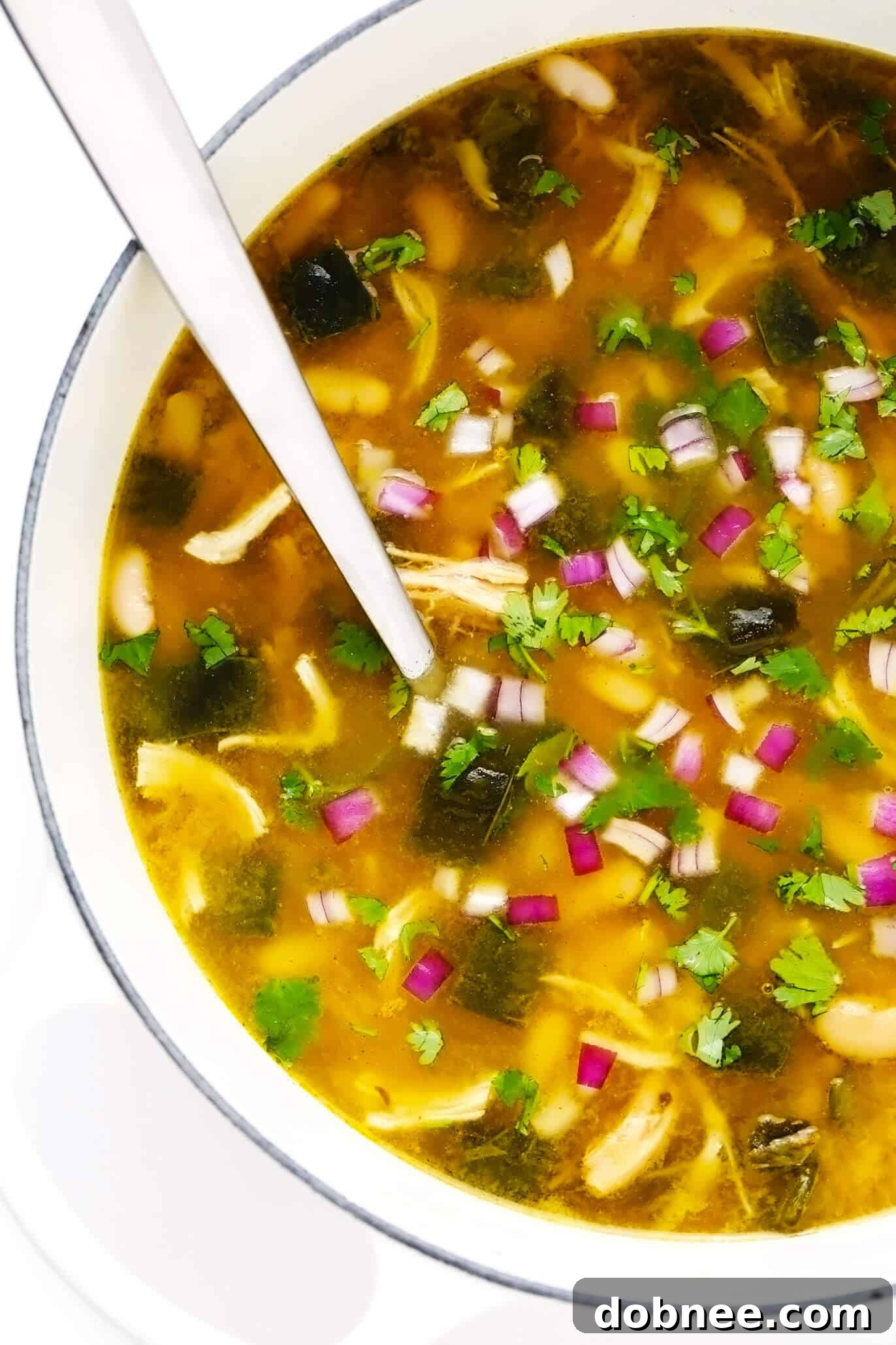 Poblano White Chicken Chili simmering in a stockpot