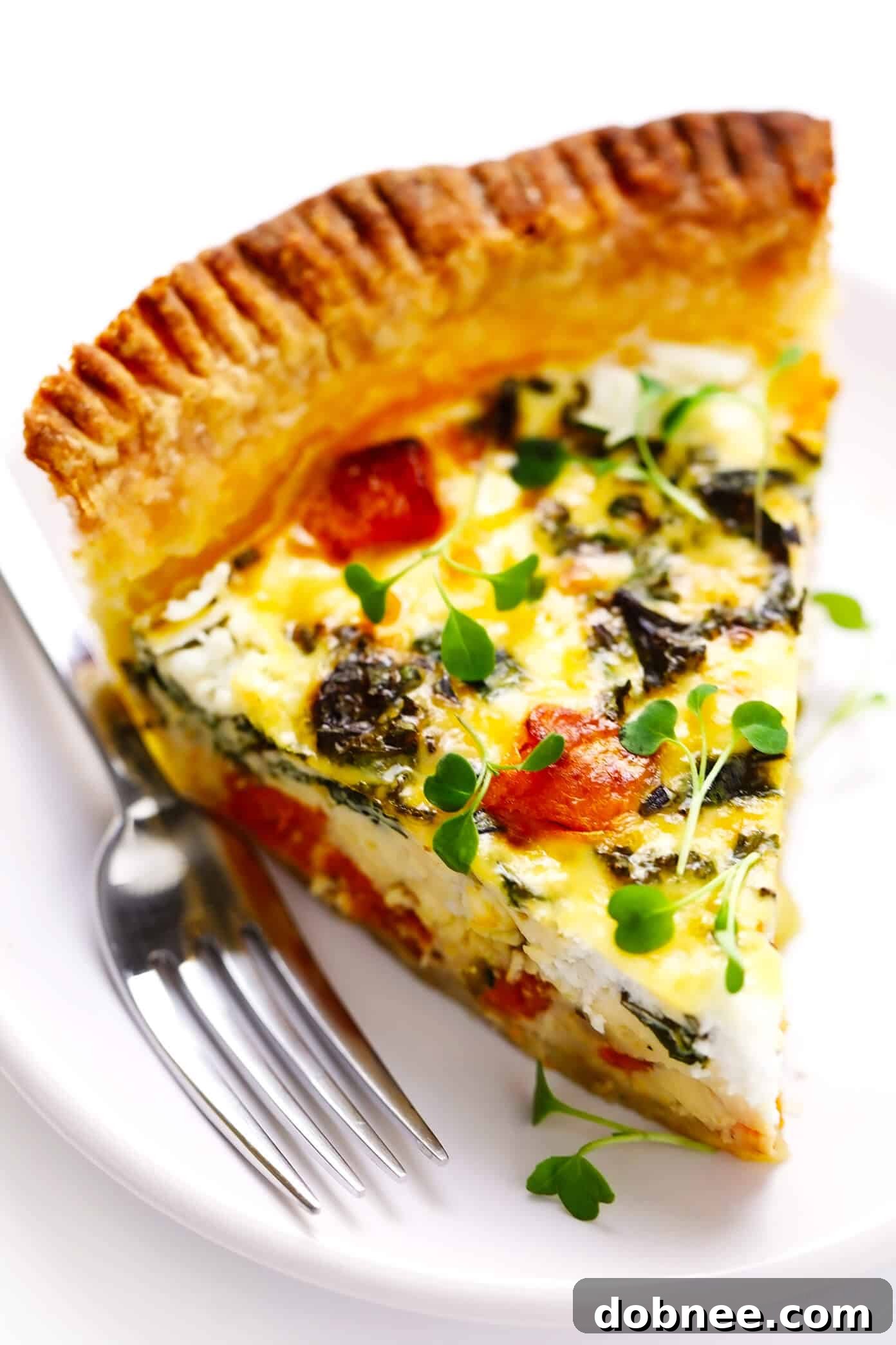 Slice of Butternut Squash Quiche on a Plate