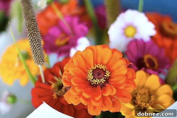 A beautiful, freshly arranged bouquet of colorful seasonal flowers from a market vendor