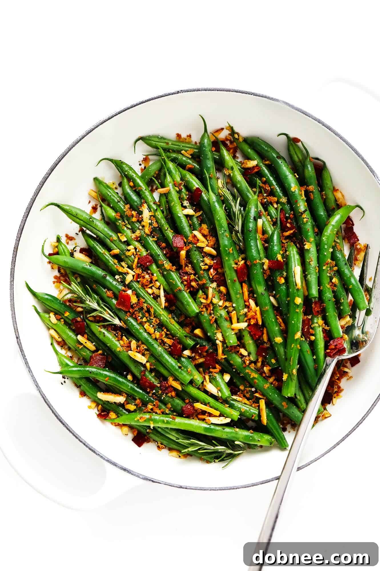 Perfectly Cooked Green Beans with Crispy Topping Green Beans with Bacon Breadcrumbs in Saute Pan with Serving Fork