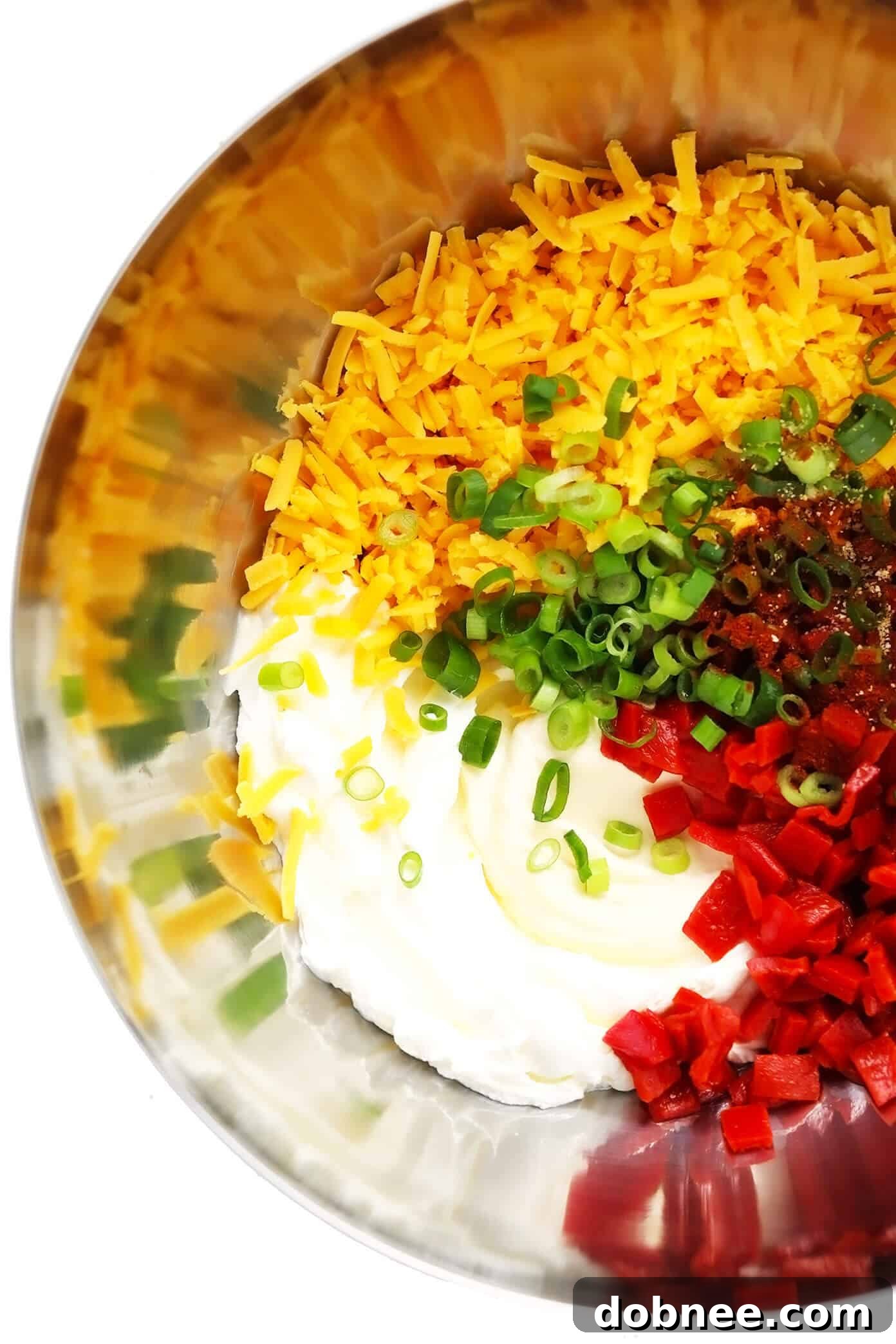 Pimento Cheese Ingredients Being Mixed in a Bowl
