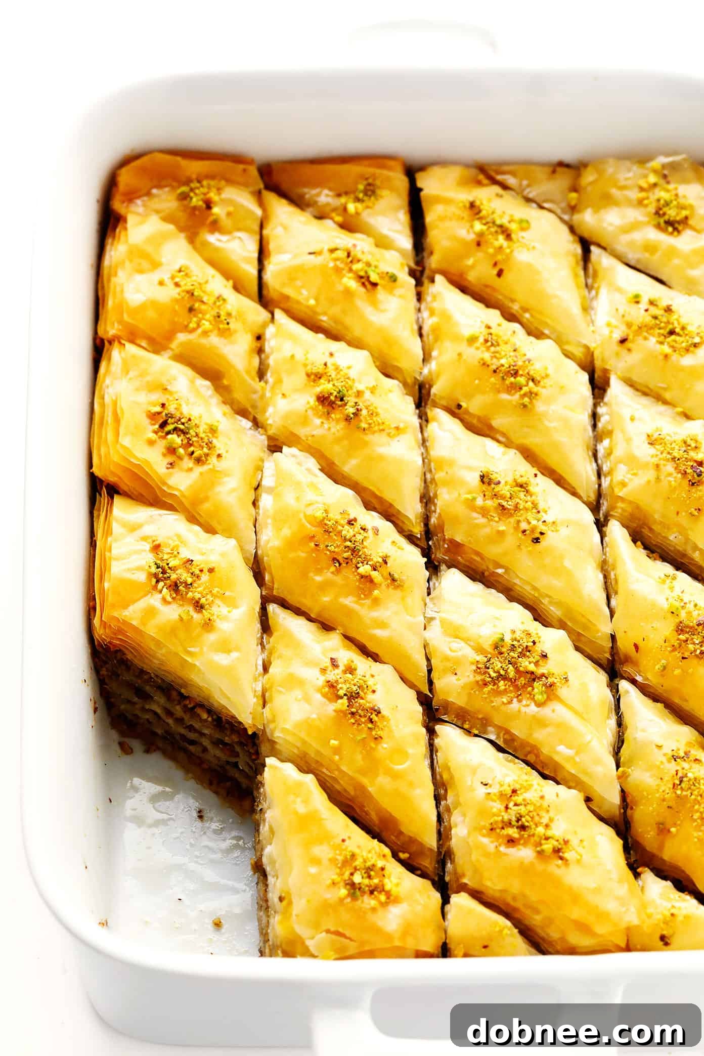 A pan full of golden, freshly baked homemade baklava
