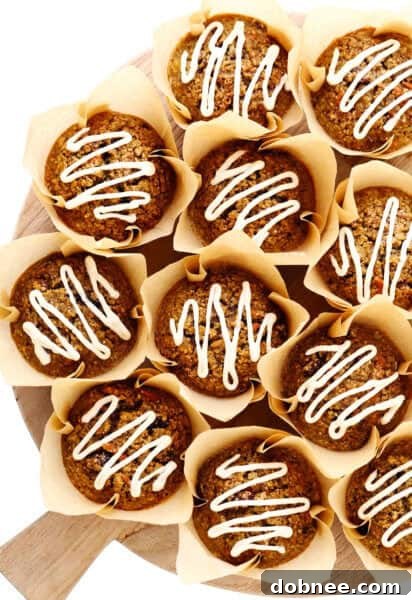 Healthy Carrot Cake Muffins with Cream Cheese Frosting