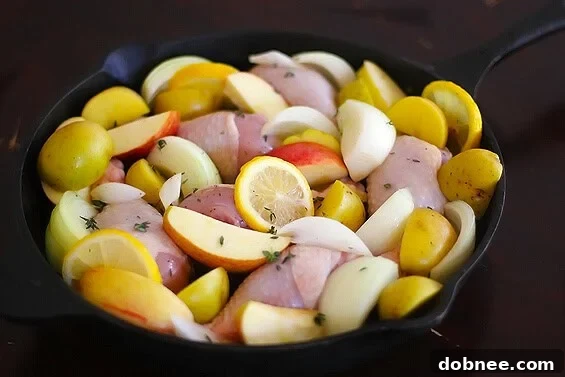 Close-up of baked chicken and potatoes infused with apple cider