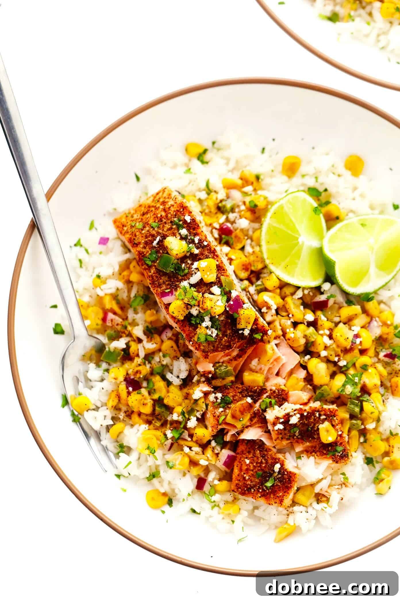 Chili Lime Salmon with Esquites and Rice in a Bowl, a complete and balanced meal