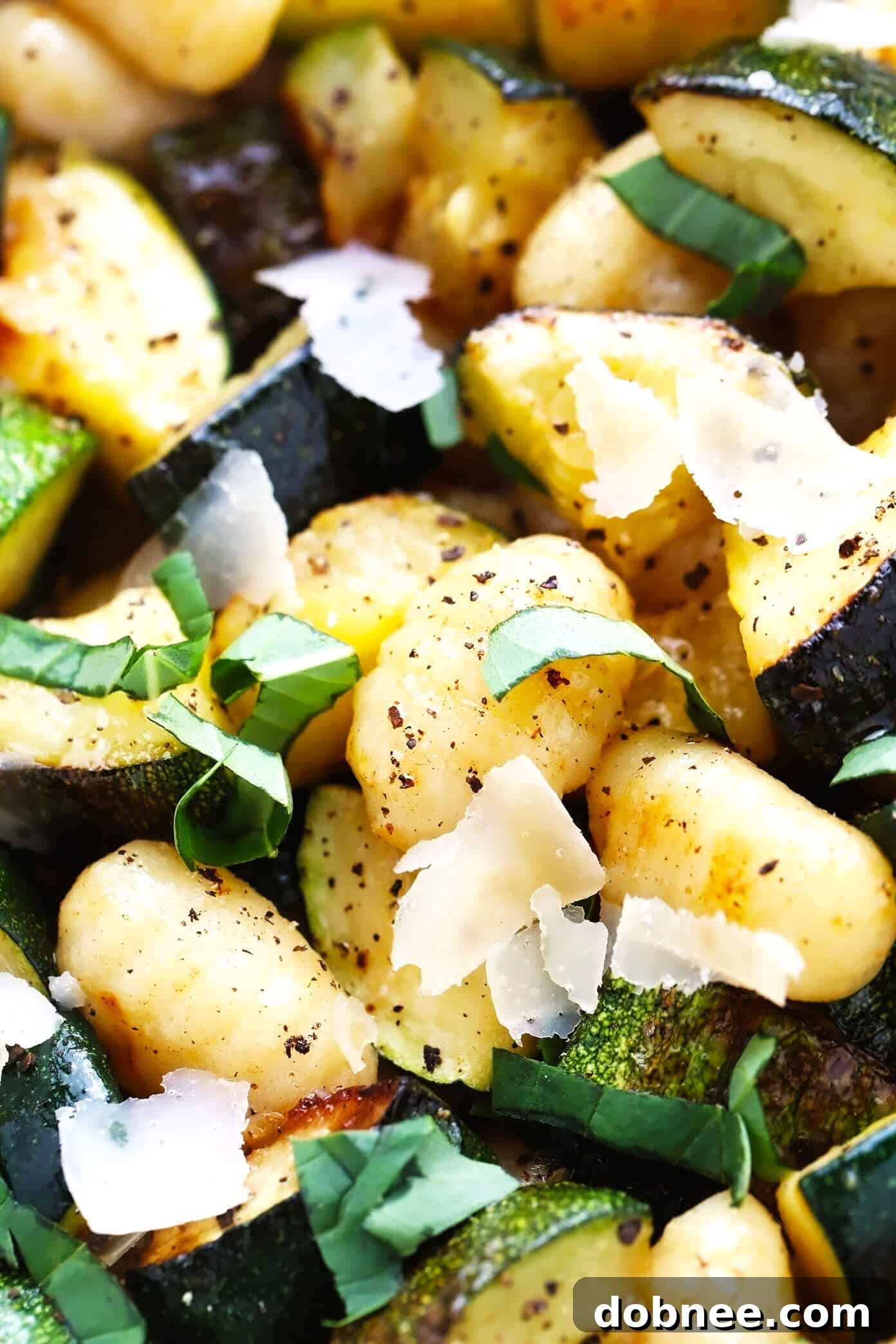 Closeup of Lemon Basil Gnocchi with Zucchini, showcasing the ingredients and sauce