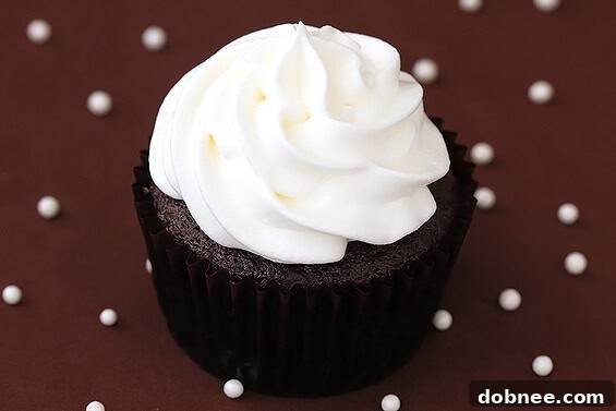 A beautifully arranged plate of White Chocolate Mocha Cupcakes, ready to be served, highlighting their delightful frosting and cozy appeal.