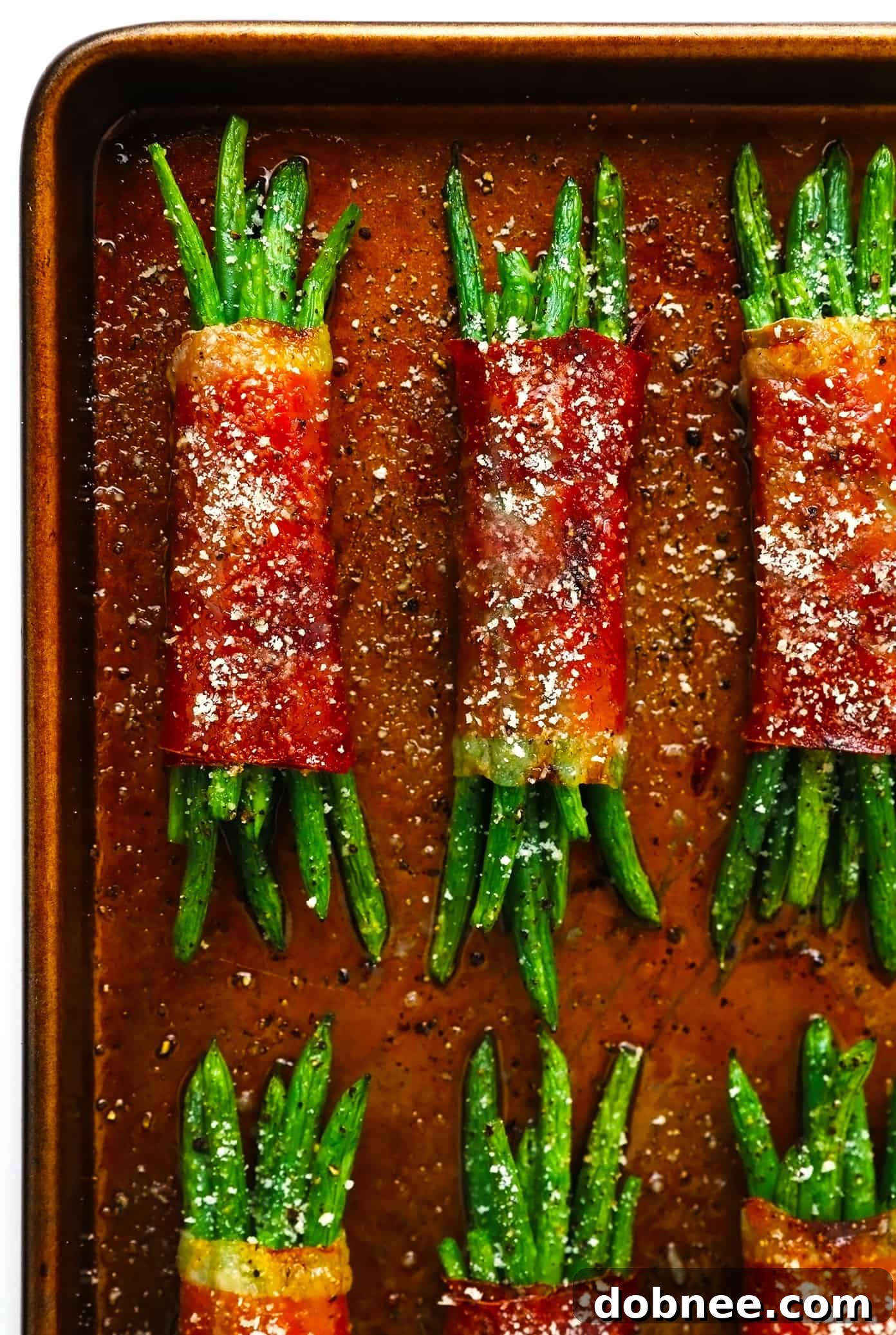 Roasted Green Bean Bundles with Prosciutto and Parmesan on Baking Sheet