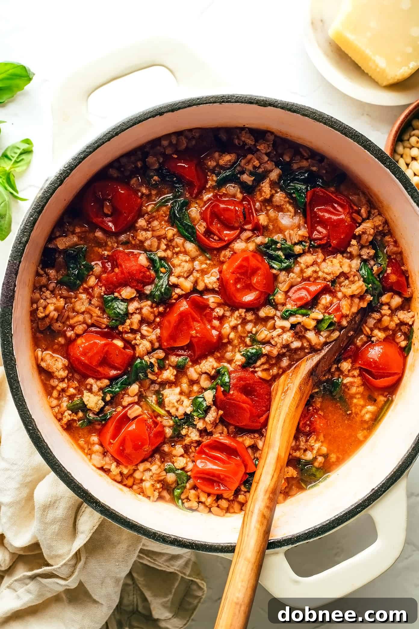 One Pot Farro with Italian Sausage and Tomatoes - A Delicious and Easy Weeknight Meal