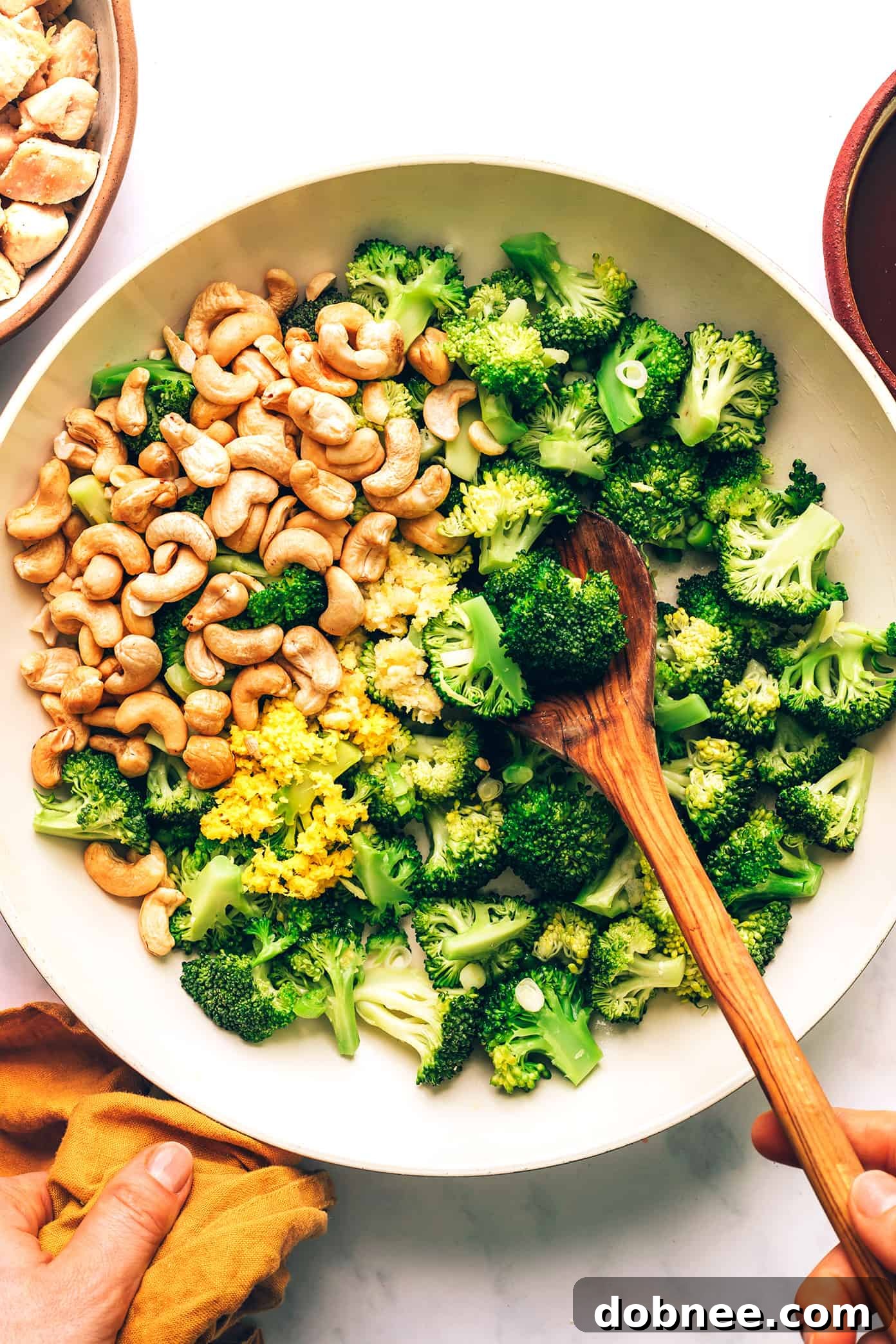 Plated Cashew Chicken and Broccoli Stir-Fry, garnished and ready