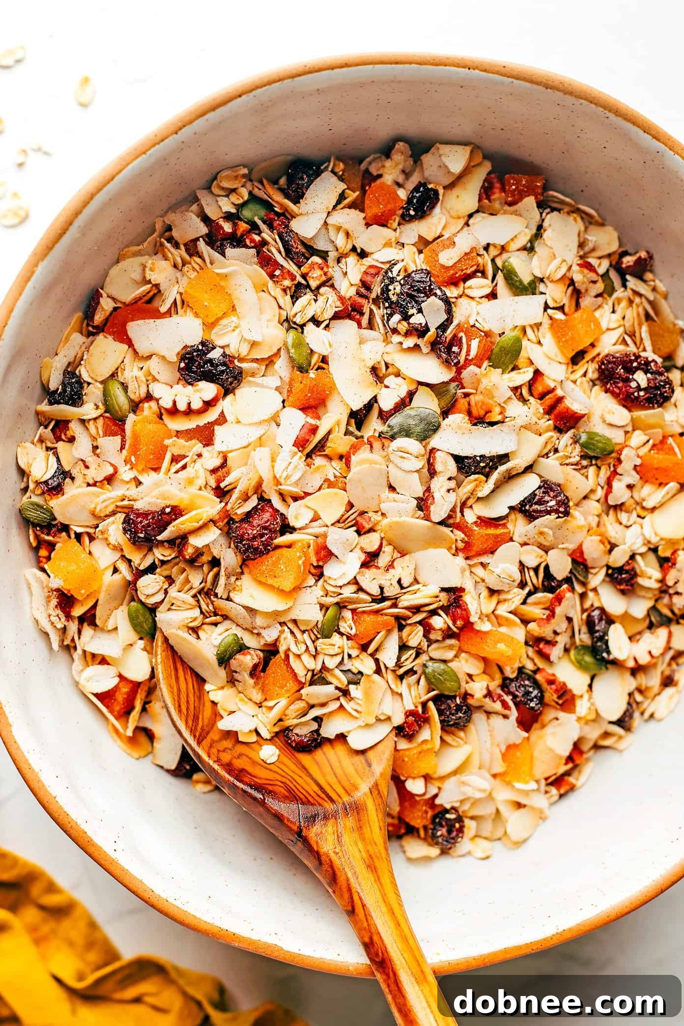 A beautifully composed bowl of homemade muesli, ready to be enjoyed with milk or yogurt.