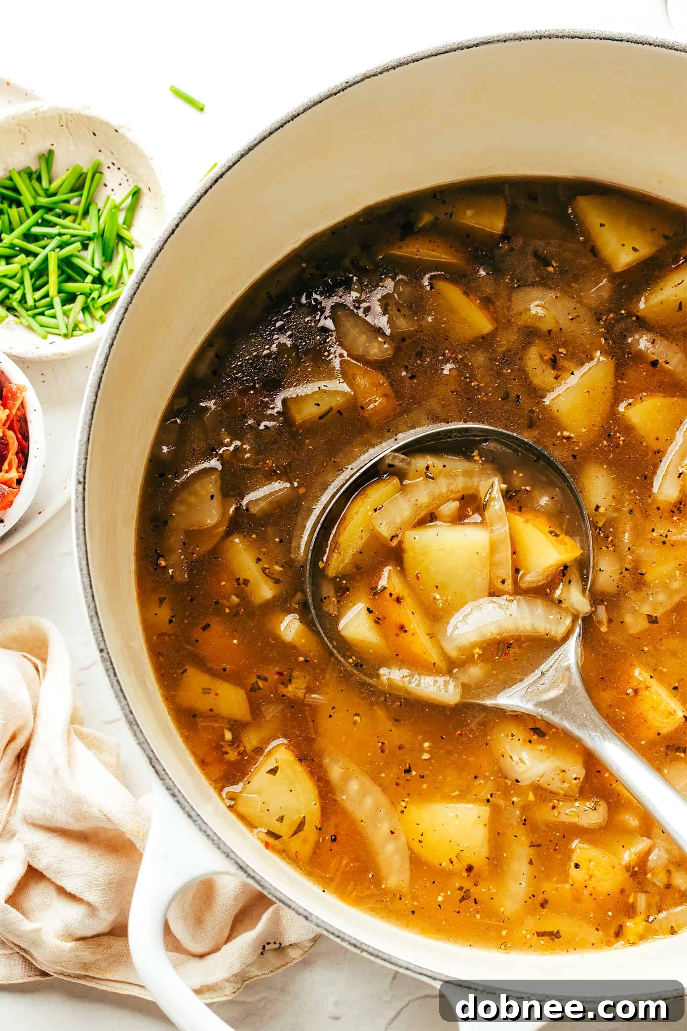 Potato Bacon Fennel Soup in Stockpot with Ladle - Ready to serve a comforting meal