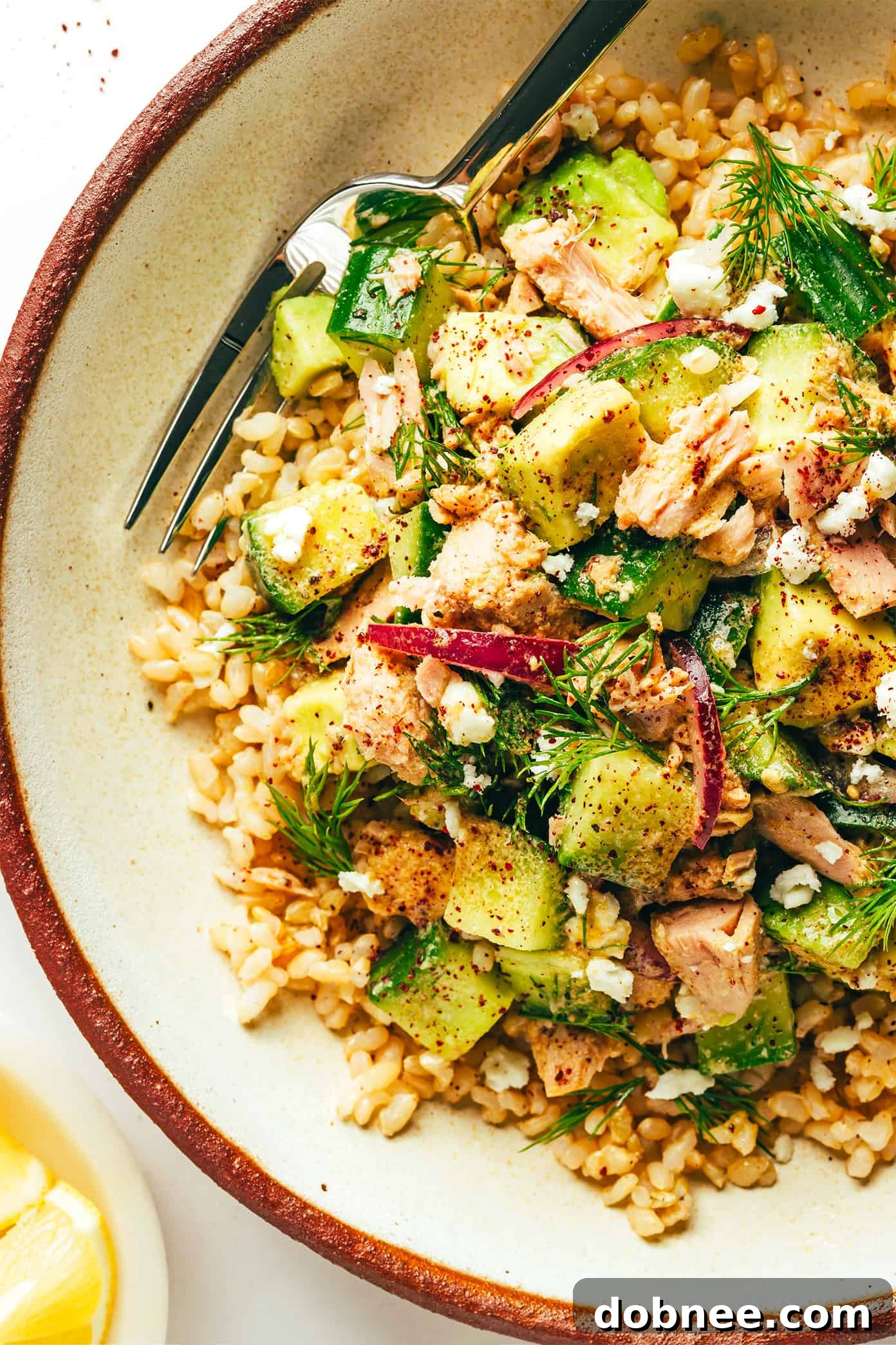 Delicious Tuna Avocado Brown Rice Bowls with fresh ingredients