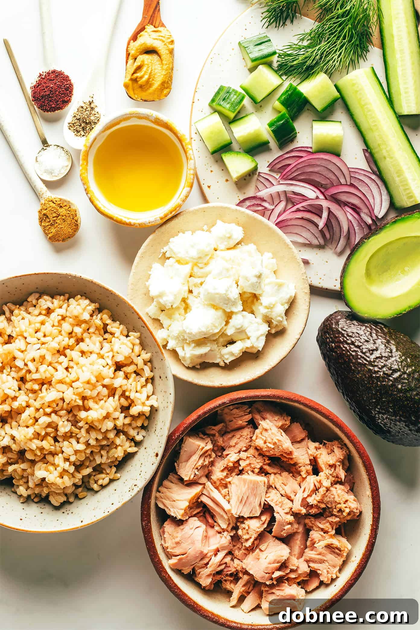 Ingredients for Tuna Avocado Brown Rice Bowls laid out