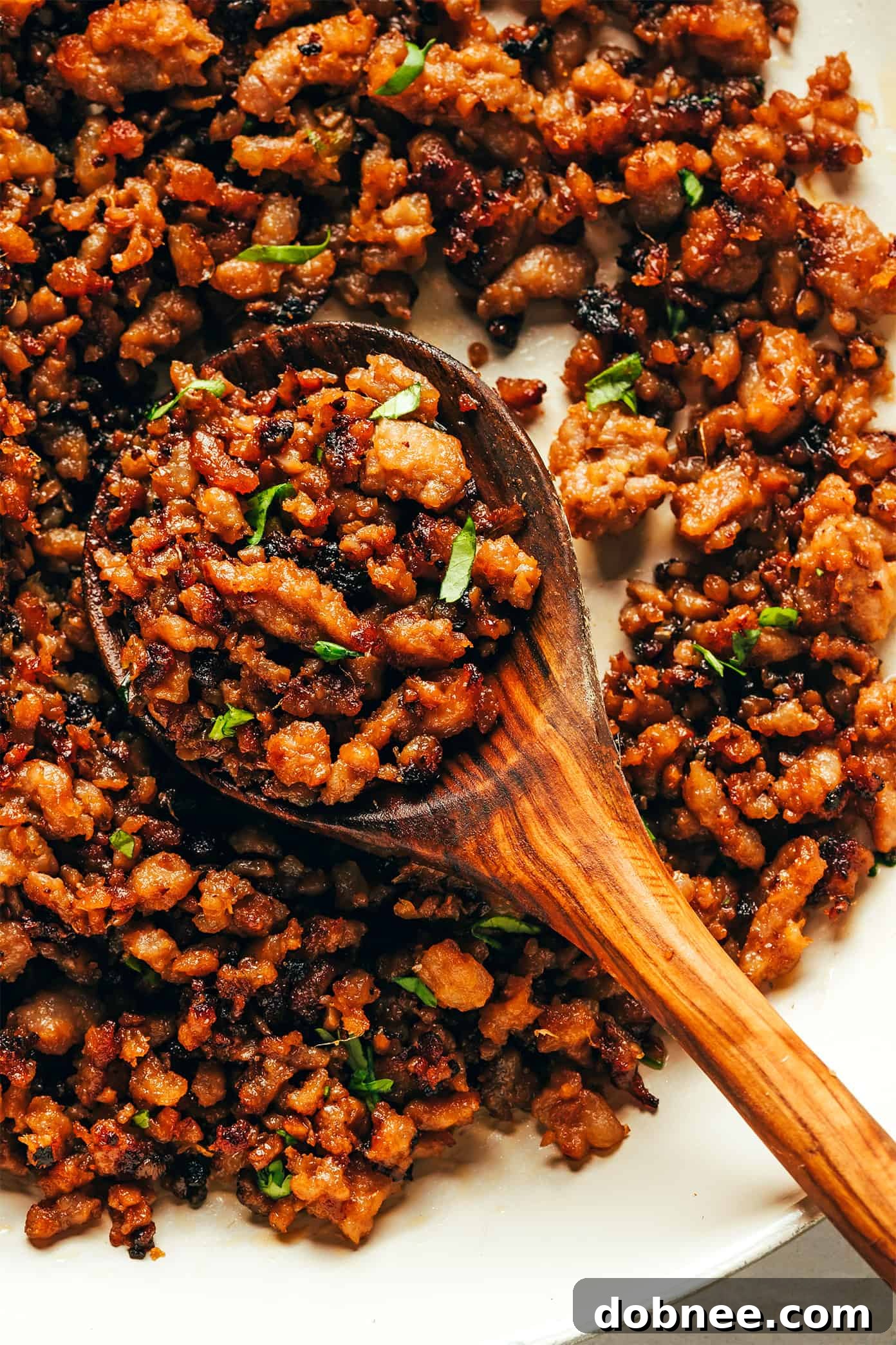A close-up view of the perfectly caramelized ground pork, showcasing its rich color and sticky texture.