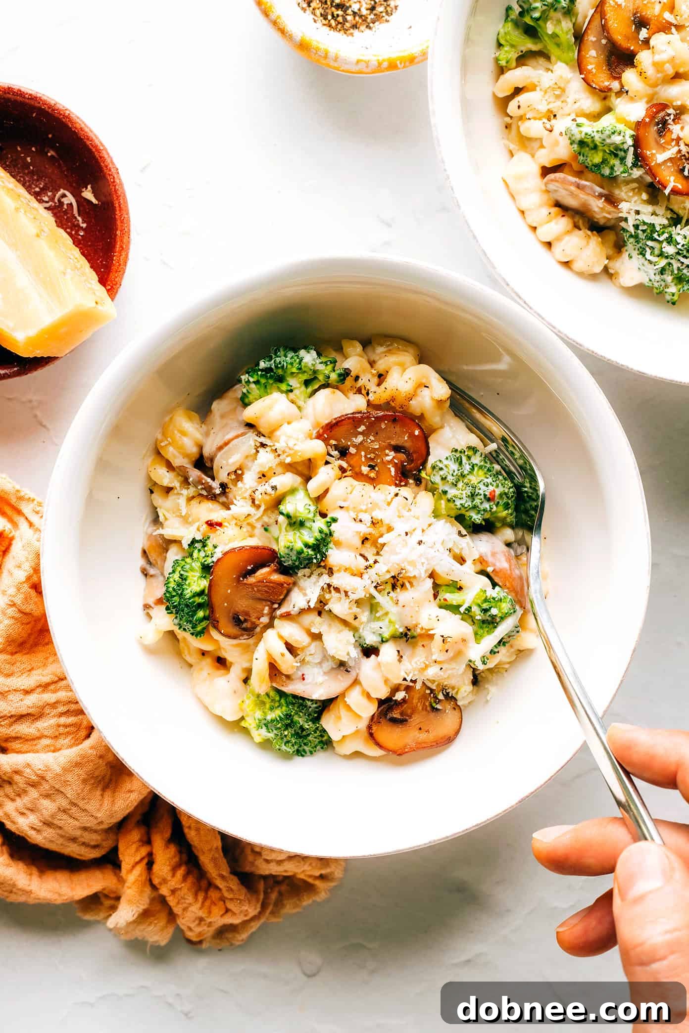 Bowl of One Pot Broccoli Mac and Cheese with Fork