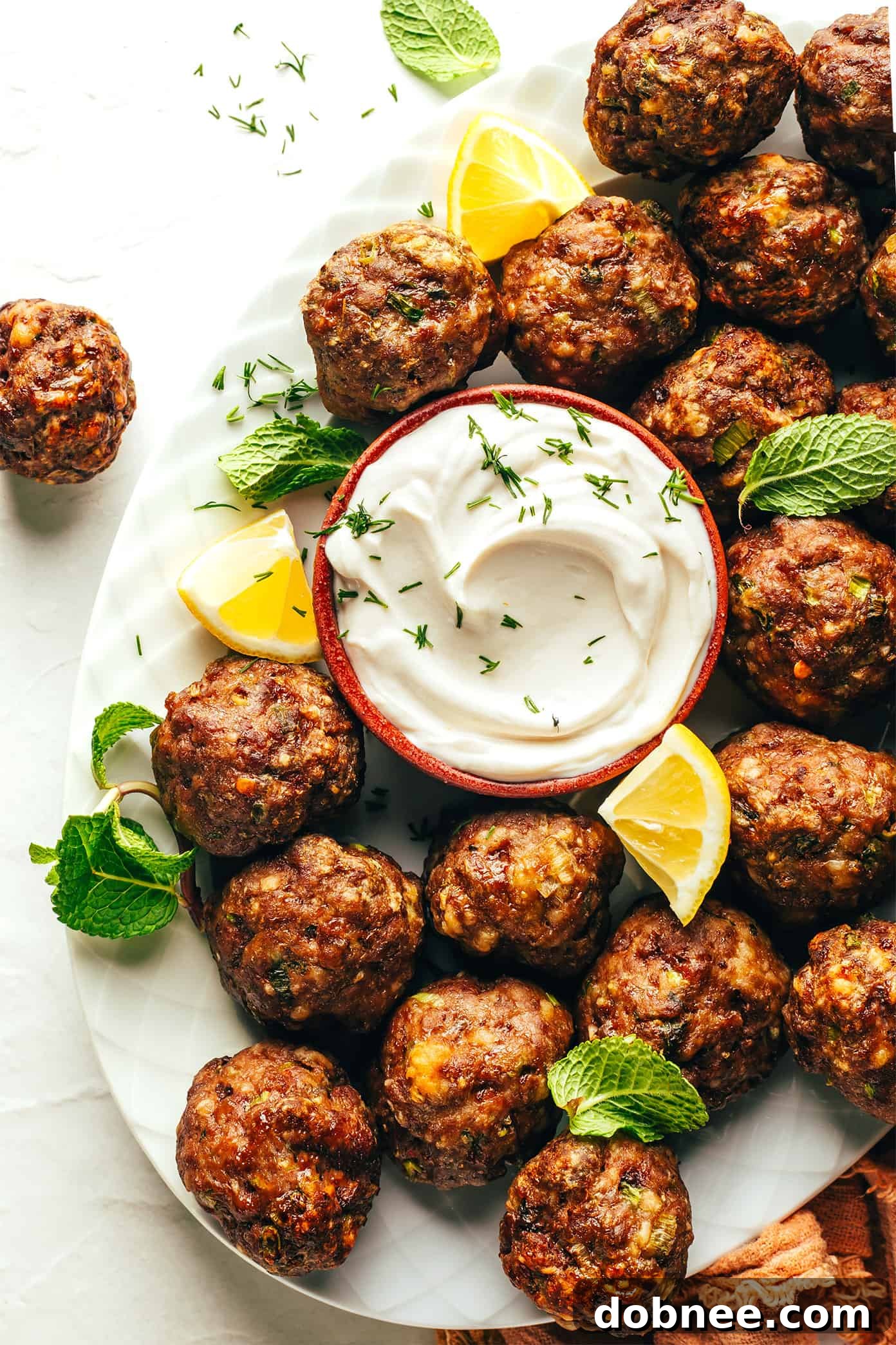 Variety of cooked Greek meatballs in a bowl