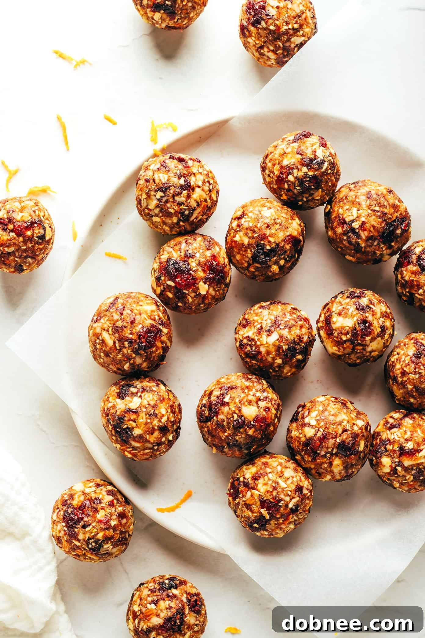 A close-up shot of Cranberry Orange Almond Energy Bites in a bowl.