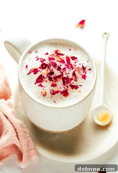 A rose latte served in an elegant cup, capturing the essence of a tranquil moment.