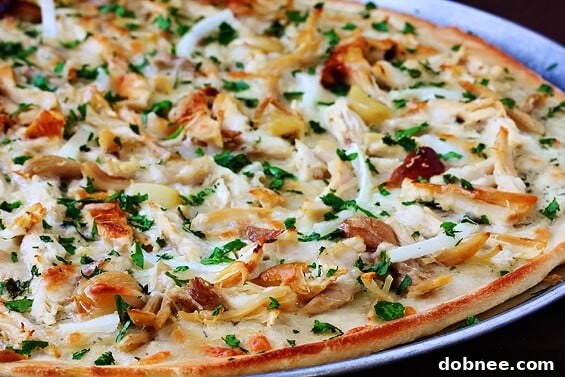 Homemade Roasted Garlic Chicken Pizza, a flavorful dinner idea