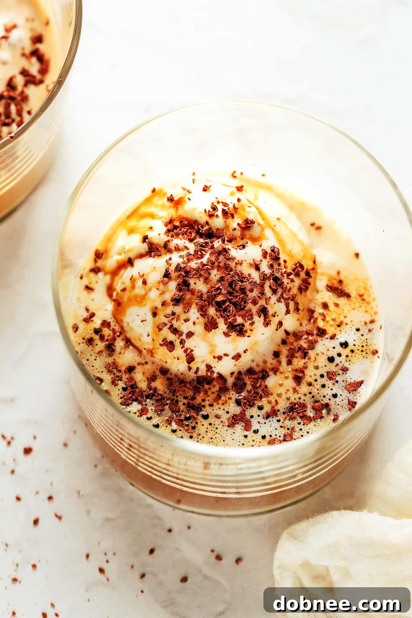 Six glasses of different affogato variations, showcasing diverse ice cream flavors and toppings.