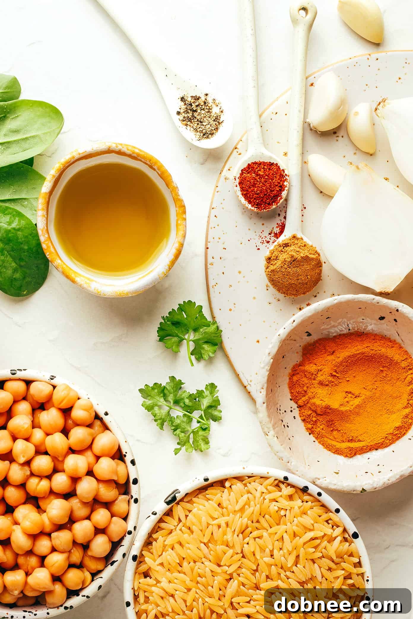 Closeup of Lemony Spiced Orzo and Chickpeas in a pan