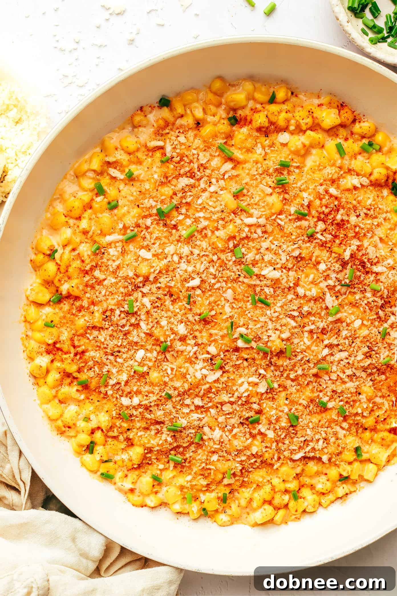 Parmesan Creamed Corn with Garlicky Breadcrumbs in Pan