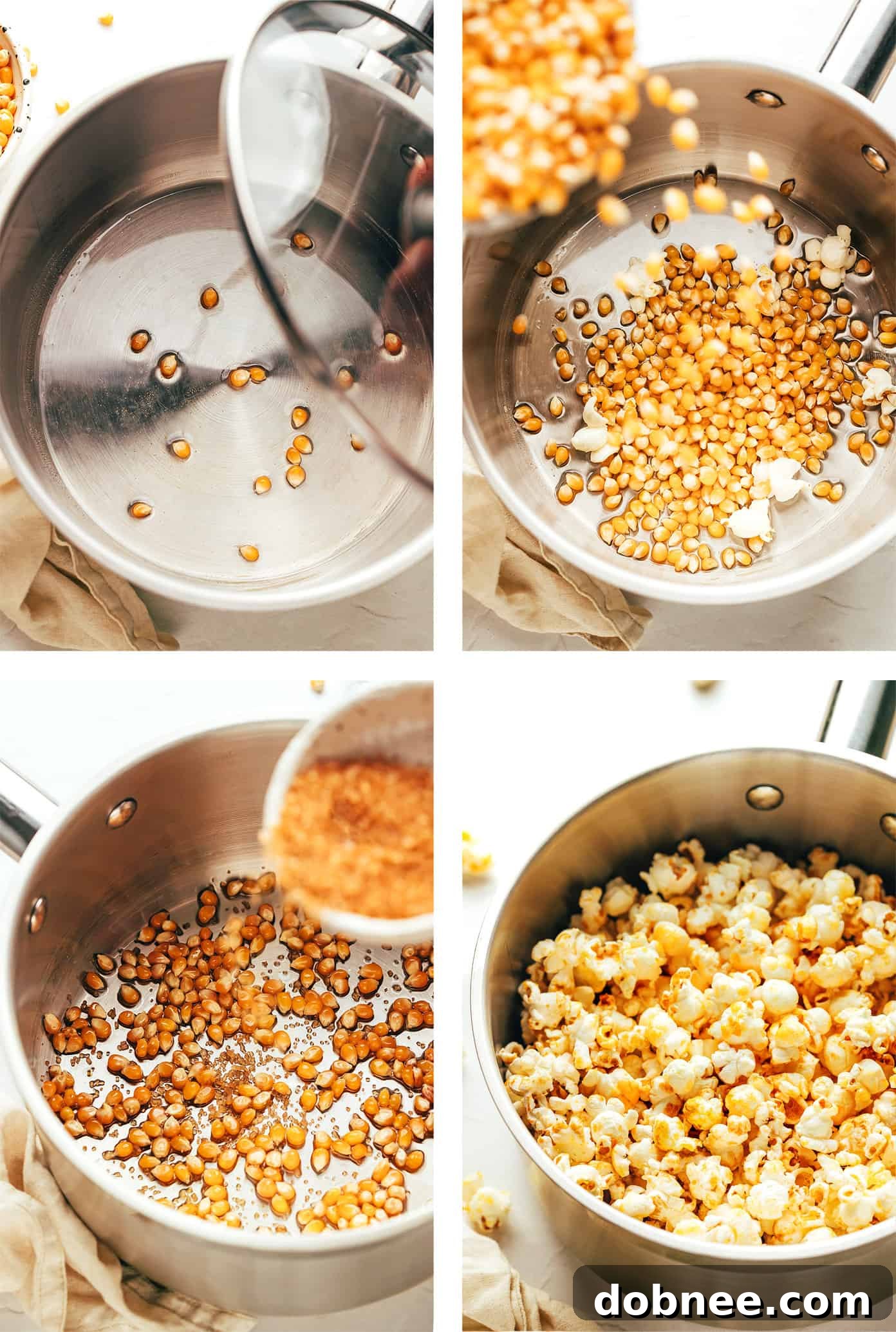 A hand reaching for freshly made kettle corn in a pot.