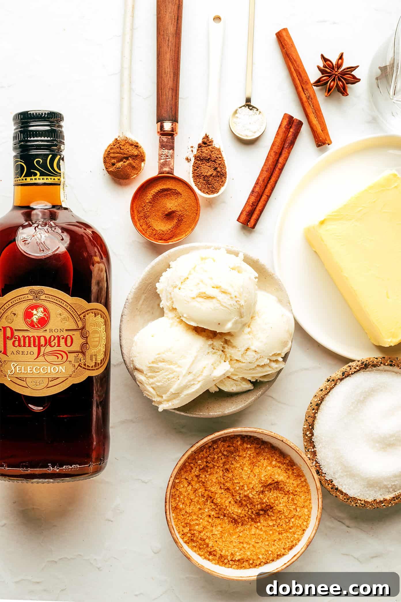 Freshly prepared hot buttered rum batter in a bowl, showcasing its rich texture and ready to be frozen for future use.