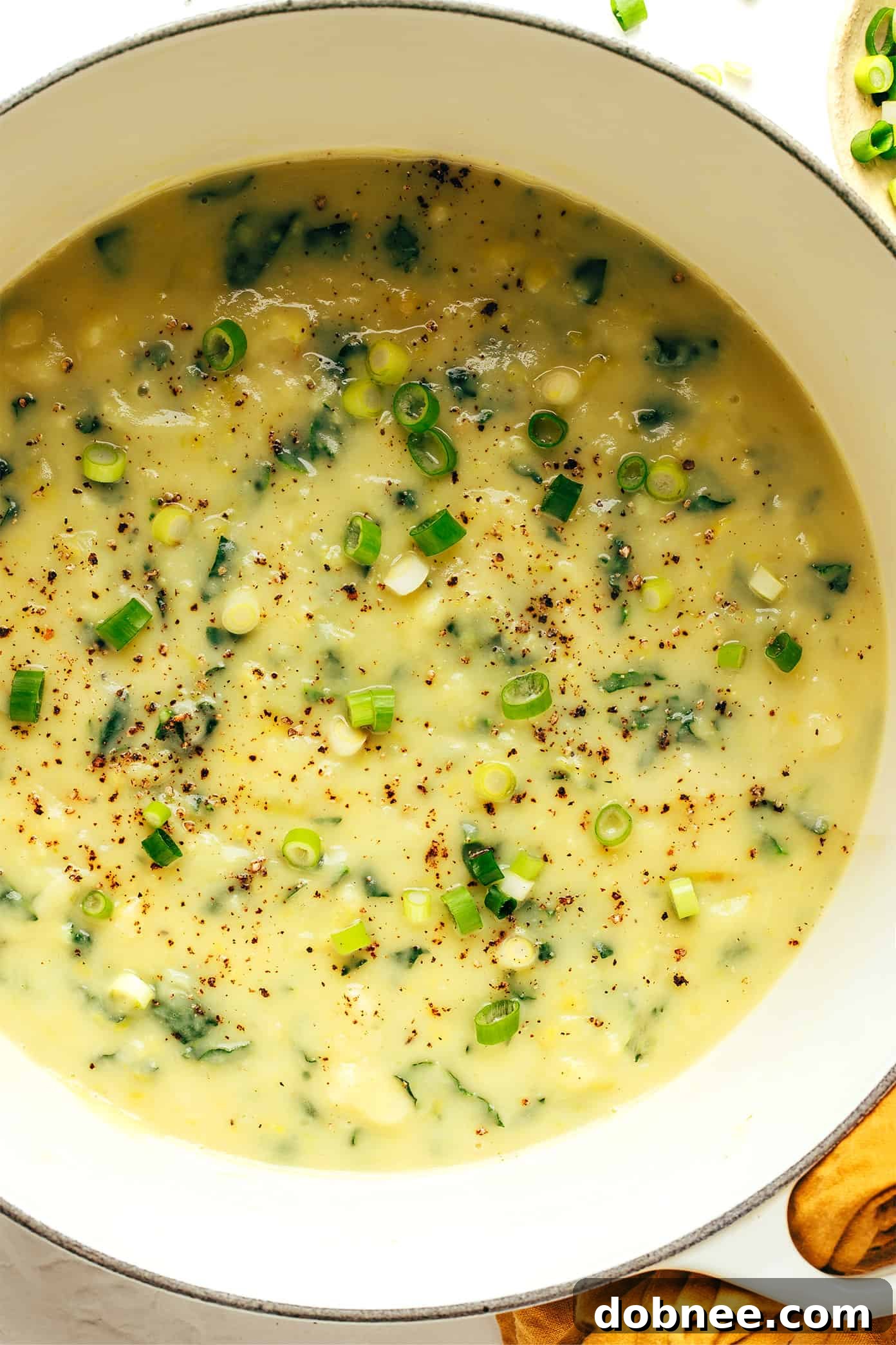 Colcannon Soup served in bowls with fresh scallions