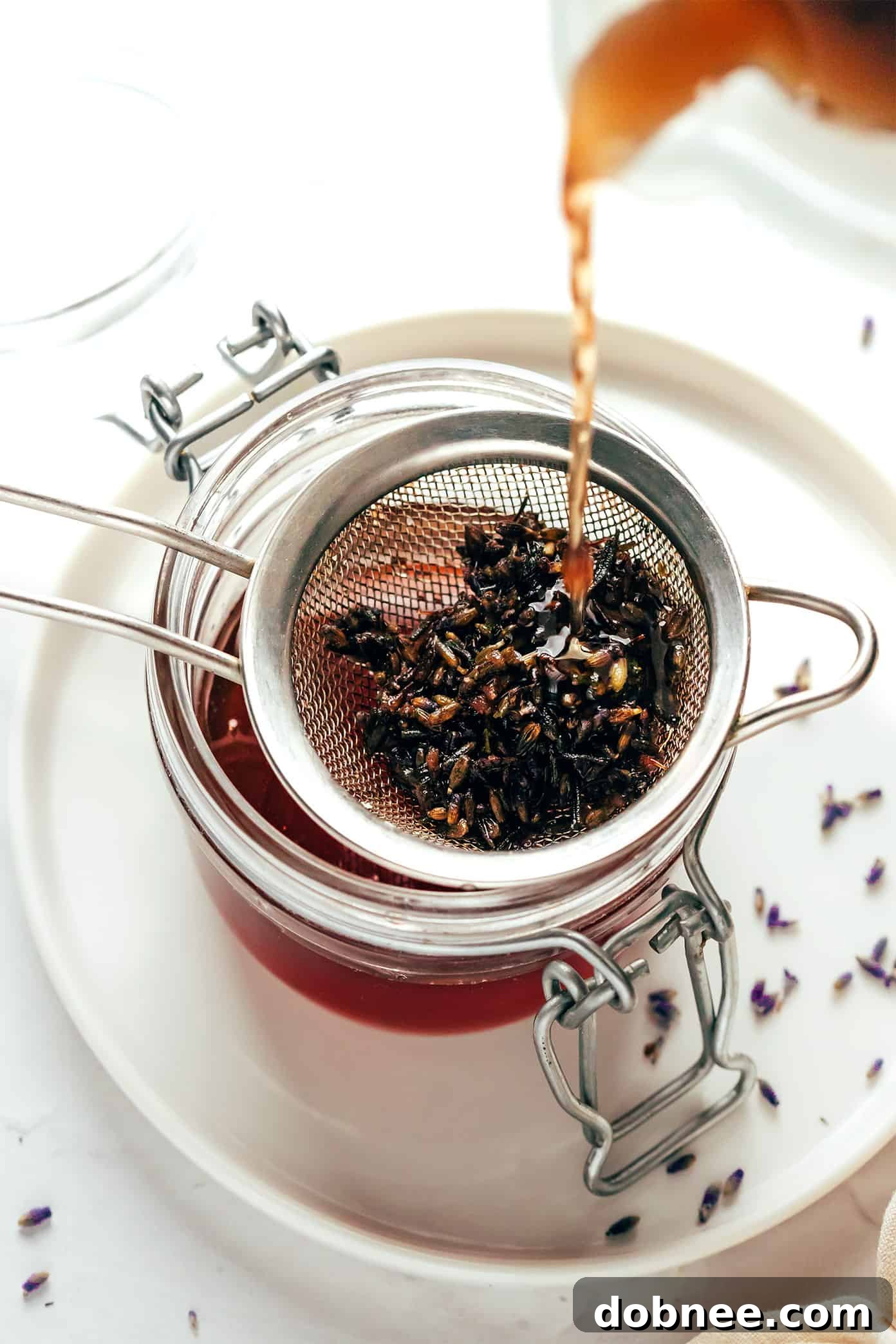 Variety of ingredients that can be used to make flavored syrups, including vanilla bean, lemon, mint, and rose petals.