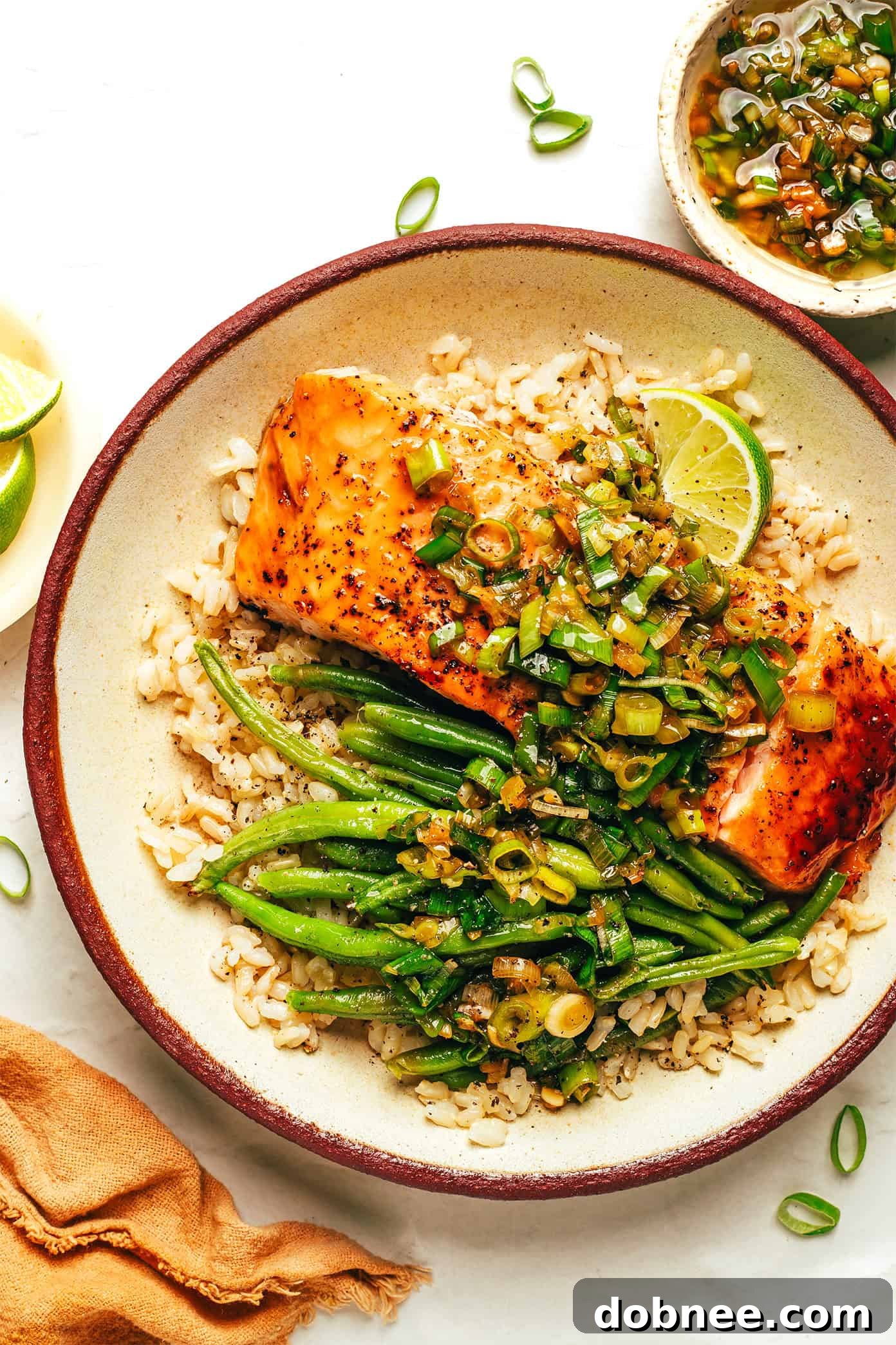 A close-up shot of a honey-glazed salmon fillet, perfectly cooked and glistening.