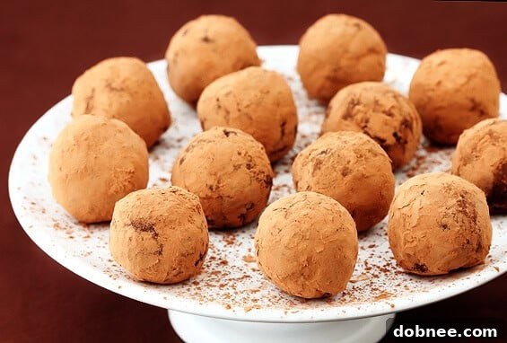 Decadent Bailey's Chocolate Truffles on a white plate