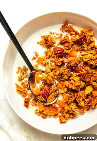 Baked Golden Granola with a rich golden color, ready to be cooled.