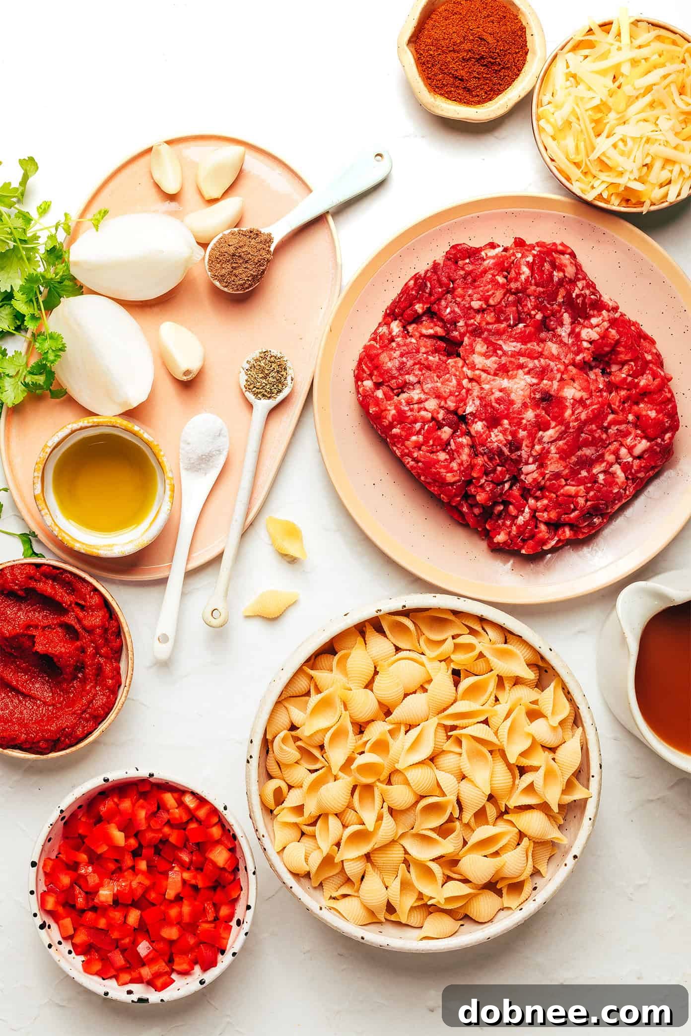 Overhead shot of a pot filled with creamy, cheesy taco pasta, ready to be served, highlighting the vibrant colors and appealing texture.