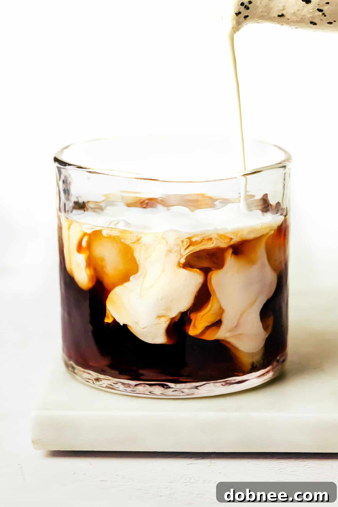 Classic White Russian cocktail in a rocks glass with ice