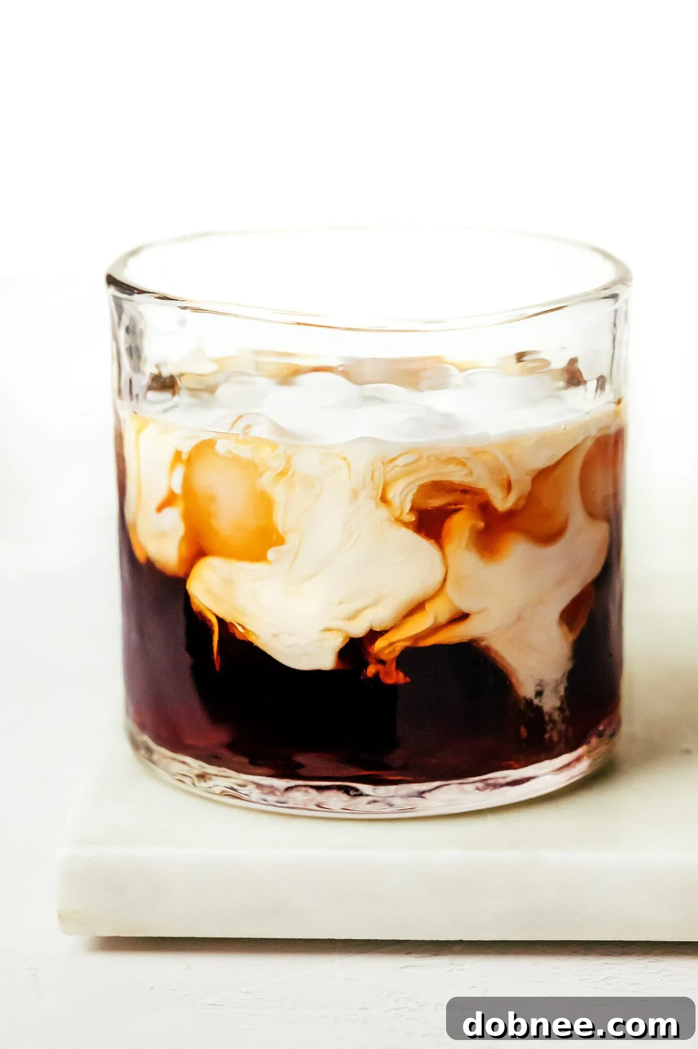 White Russian cocktail with coffee beans garnish