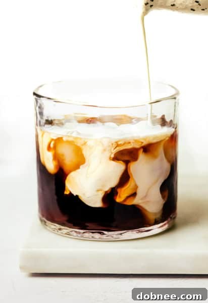 White Russian cocktail with coffee beans
