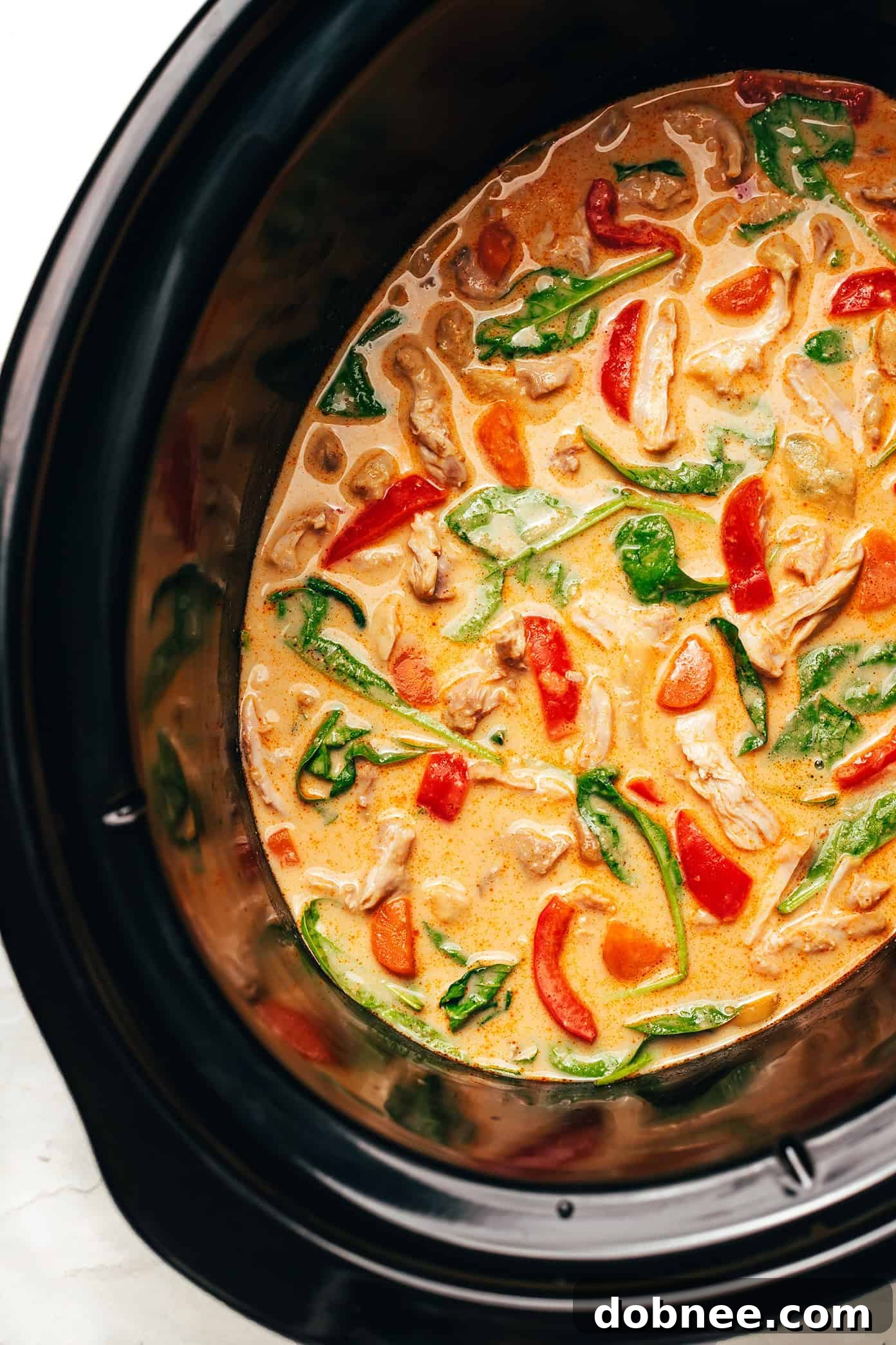Close up of a bowl of Slow Cooker Chicken Satay