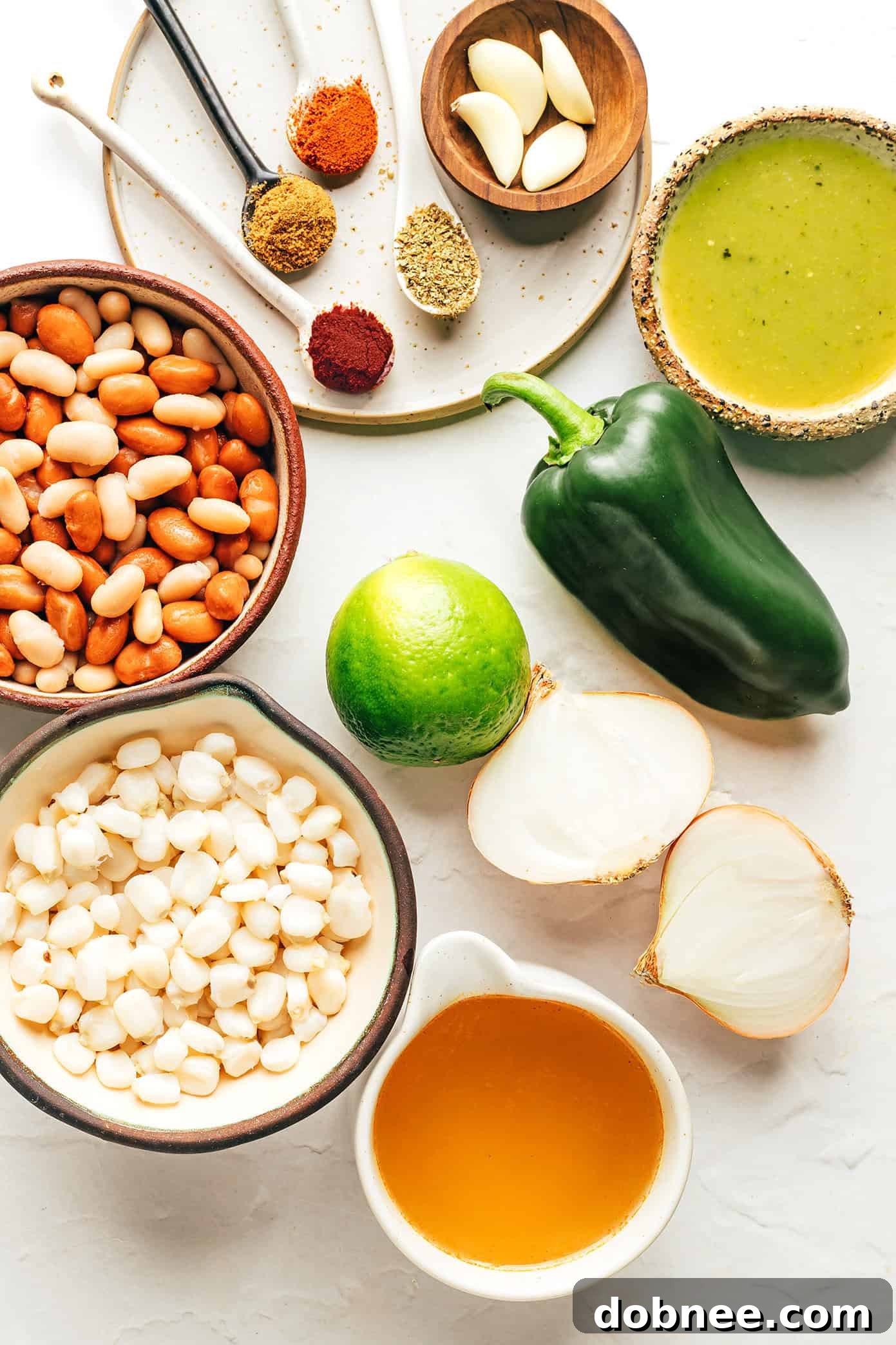 Plant-Powered Pozole 3 Three bowls of vegetarian pozole with various toppings, seen from above, showcasing the rich colors and textures.