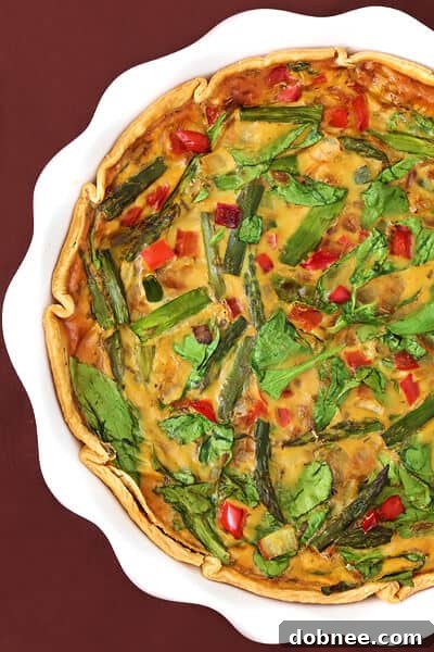 Tall slice of Dairy-Free Vegetable Quiche